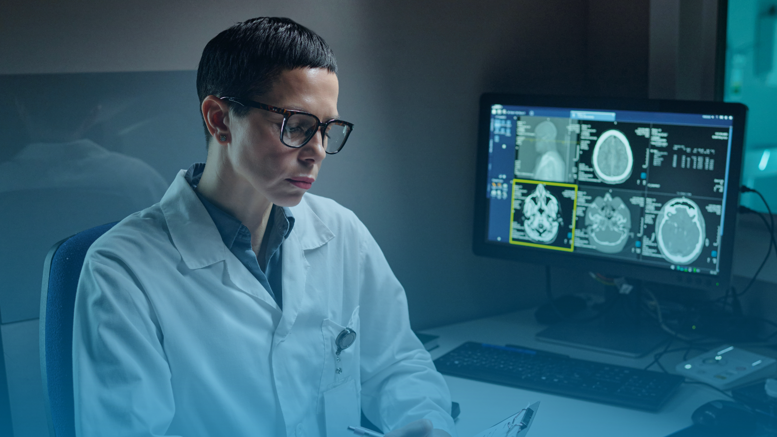 A doctor reviewing brain scans