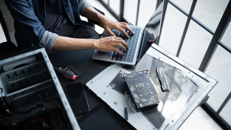 Person typing on laptop